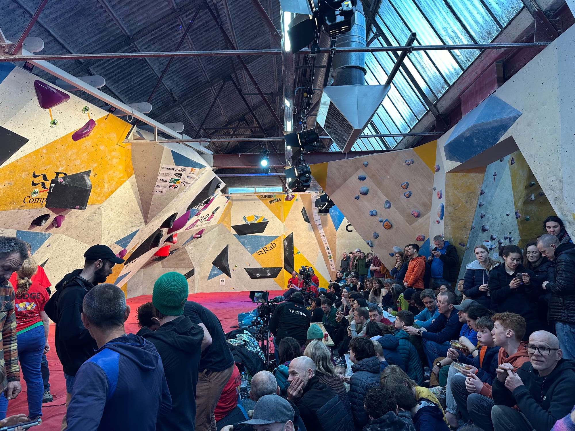The audience getting settled in the Climbing Works before the final