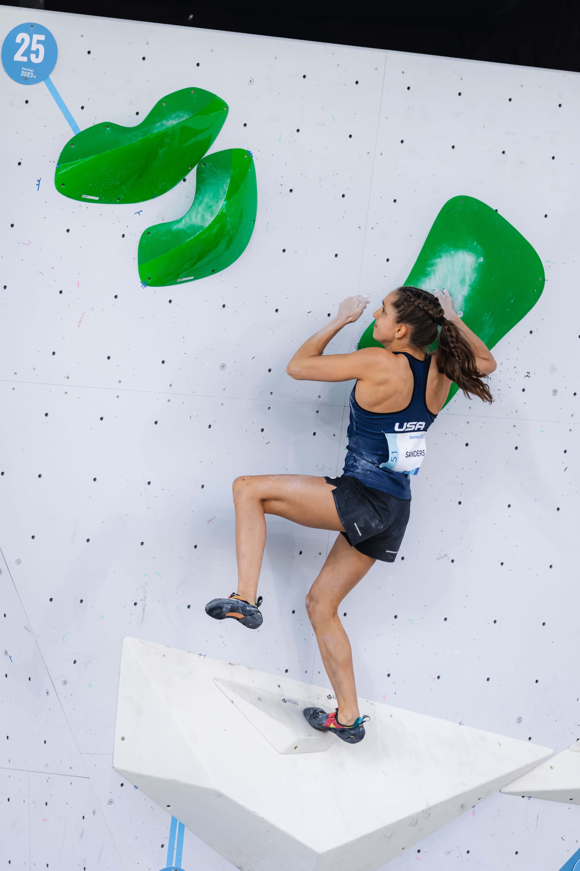 Annie Sanders in flight in the final dynamic section of Boulder 1