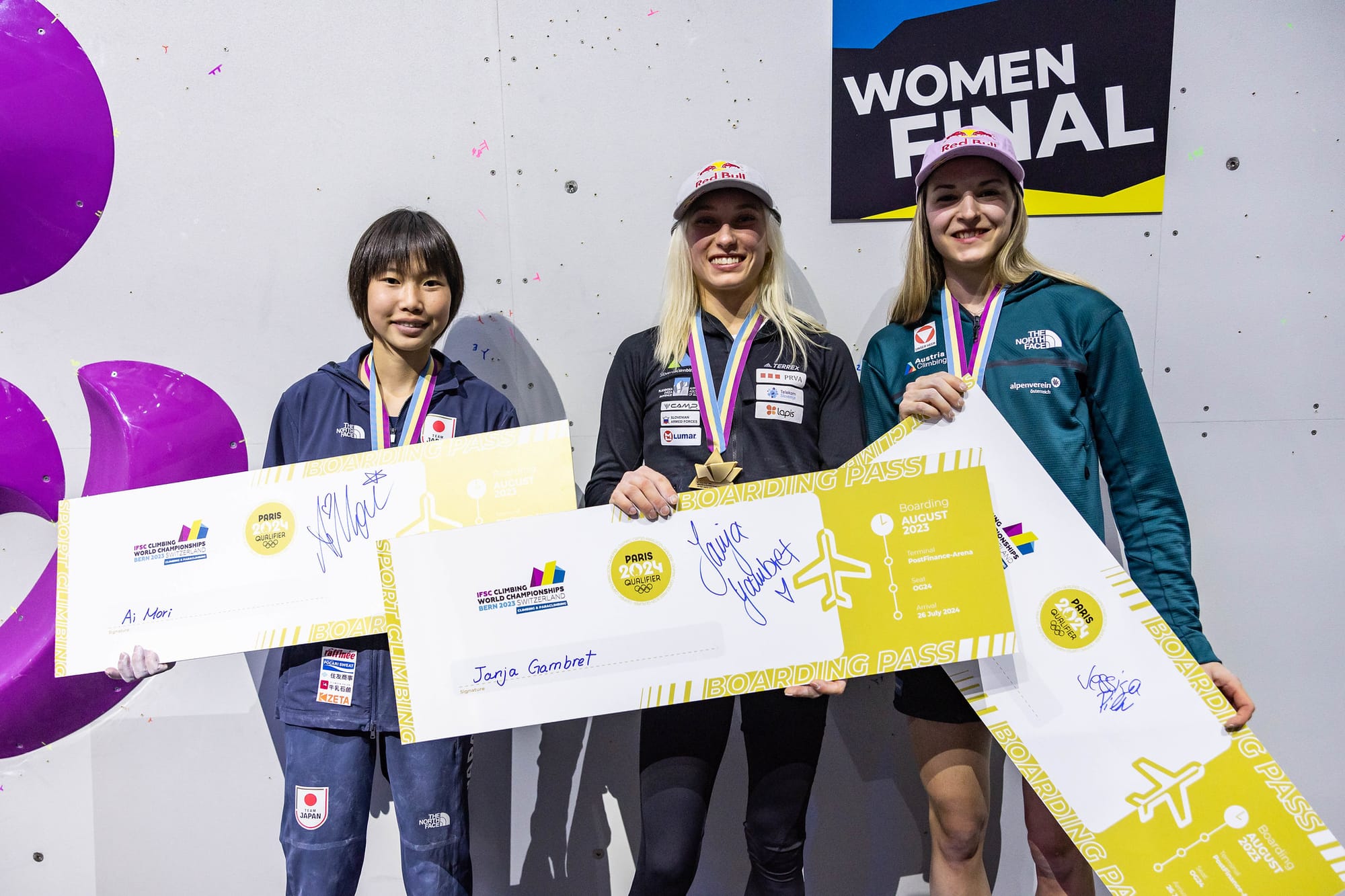 Janja Garnbret, Jessica Pilz and Ai Mori on the podium with their Olympic tickets