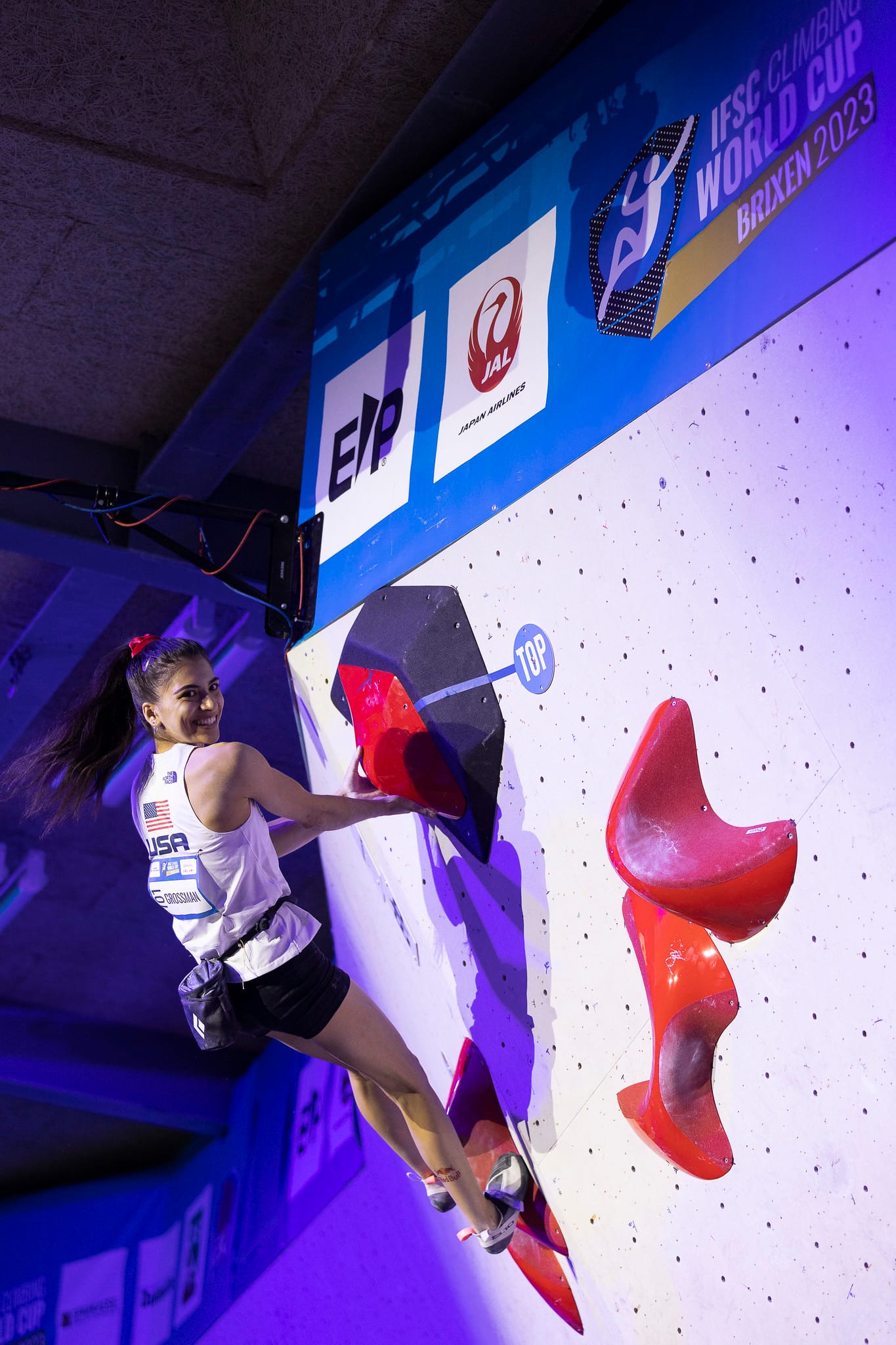 Natalia Grossman topping out the second women's final boulder of the 2023 IFSC World Cup in Brixen, Italy